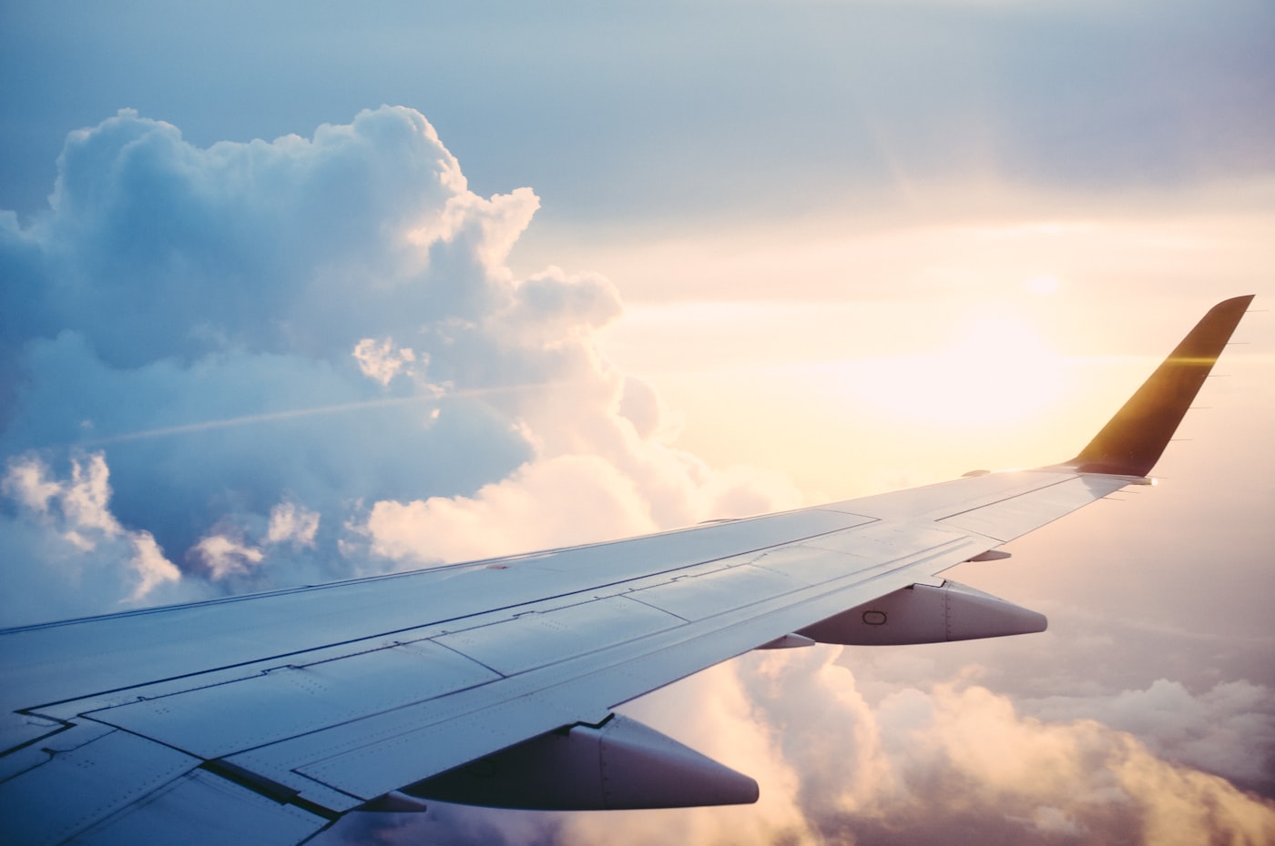 Aircraft wing above the clouds