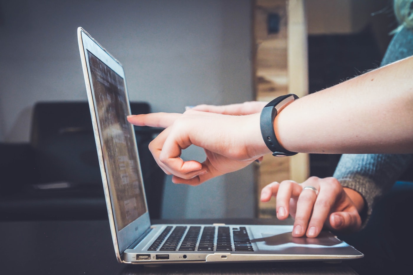 Pointing at results on a laptop screen